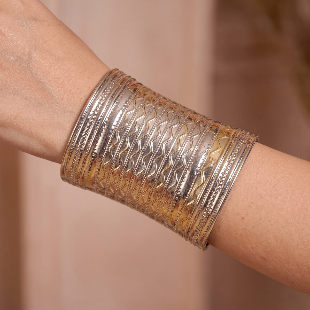 Garbha-Glow Multi-Row Wavy Metal Handcuff